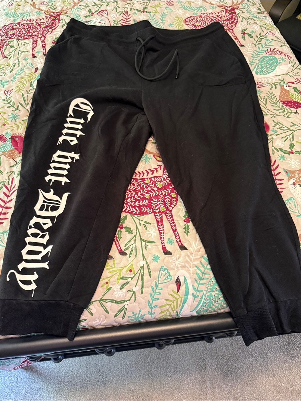 Black lovesick Sweatpants with 'Cute but Deadly' Graphic